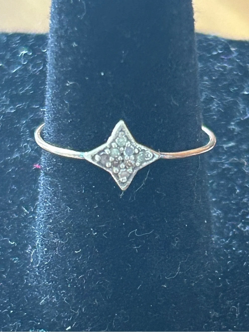 Petite diamond gold and sterling ring.